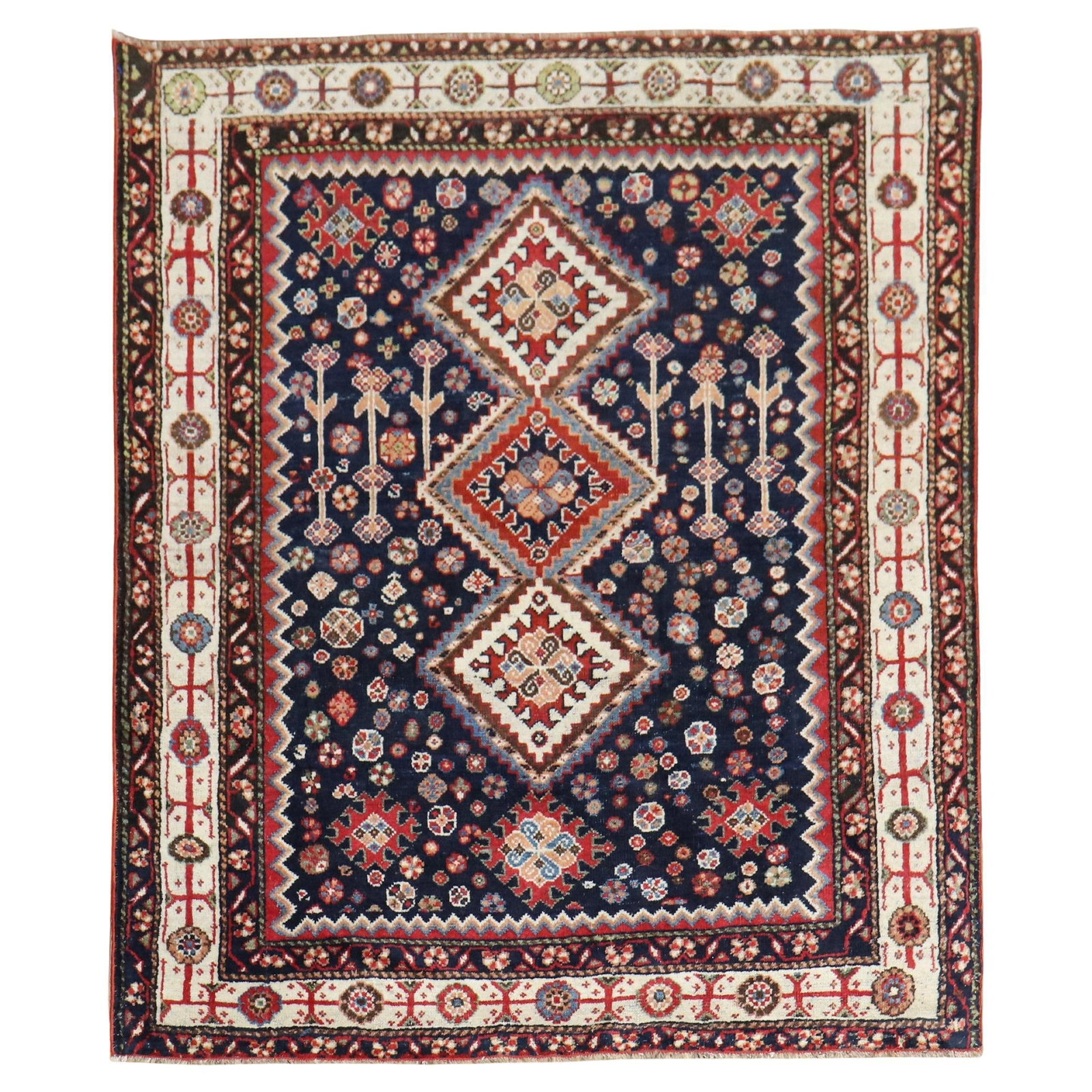 Antique Persian Shiraz Rug 4'9 x 5'5 Hand-Woven Wool: Antique Persian Shiraz Rug 4'9 x 5'5 Hand-Woven Wool Discover the exquisite charm of this early 20th-century Persian Shiraz rug, meticulously hand-woven from high-quality wool. With its geometric desi