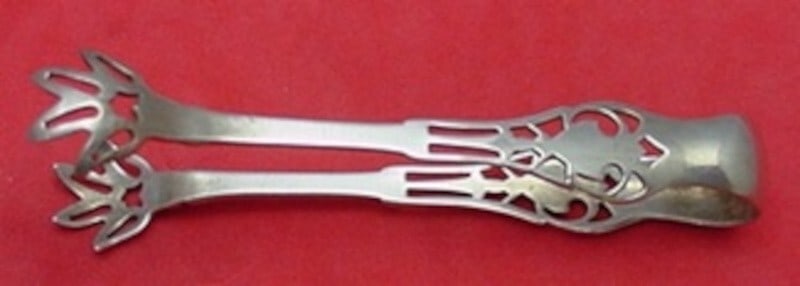 Watson Putnam Sterling Silver Sugar Tong 3 1/4 Inch Serving Piece: Watson Putnam Sterling Silver Sugar Tong 3 1/4 Inch Serving Piece Experience the elegance of the Putnam pattern by Watson with this exquisite sterling silver sugar tong. Measuring 3 1/4 inches, this s