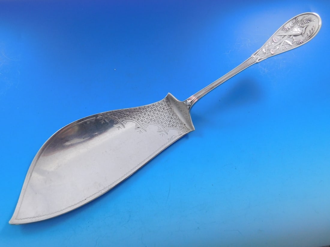 Tiffany & Co Japanese Sterling Silver Fish Server 12 1/8" Geometric Design: Tiffany & Co Japanese Sterling Silver Fish Server 12 1/8" Geometric Design This exquisite fish server from Tiffany & Co. showcases the elegant Japanese pattern, reflecting the artistry of the late 19t