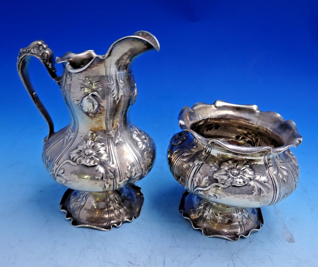 Art Nouveau Sterling Silver Sugar and Creamer Set Hand Hammered Martele Style: Art Nouveau Sterling Silver Sugar and Creamer Set Hand Hammered Martele Style This sterling silver sugar bowl and creamer set by Black Starr & Frost showcases exquisite Art Nouveau design in a fine ha
