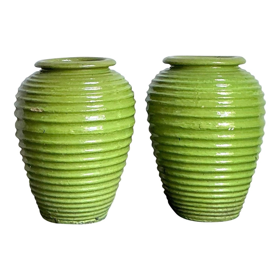 Pair of Monumental Chartreuse Glazed Ceramic Amphora Urn Planters: Pair of Monumental Chartreuse Glazed Ceramic Amphora Urn Planters This pair of monumental glazed ceramic urns features a classical amphora silhouette with thick, deeply ribbed horizontal detailing for