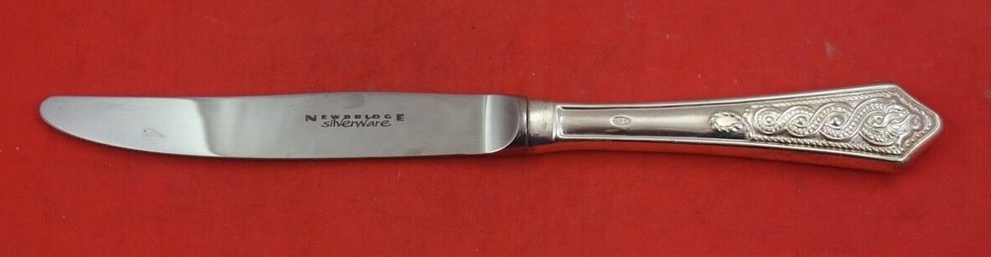 Celtic Pattern Sterling Silver Dinner Knife by Newbridge 9.5": Celtic Pattern Sterling Silver Dinner Knife by Newbridge 9.5" This modern 9 1/2" dinner knife features a Celtic pattern and is crafted from sterling silver with a hollow handle and a stainless steel b