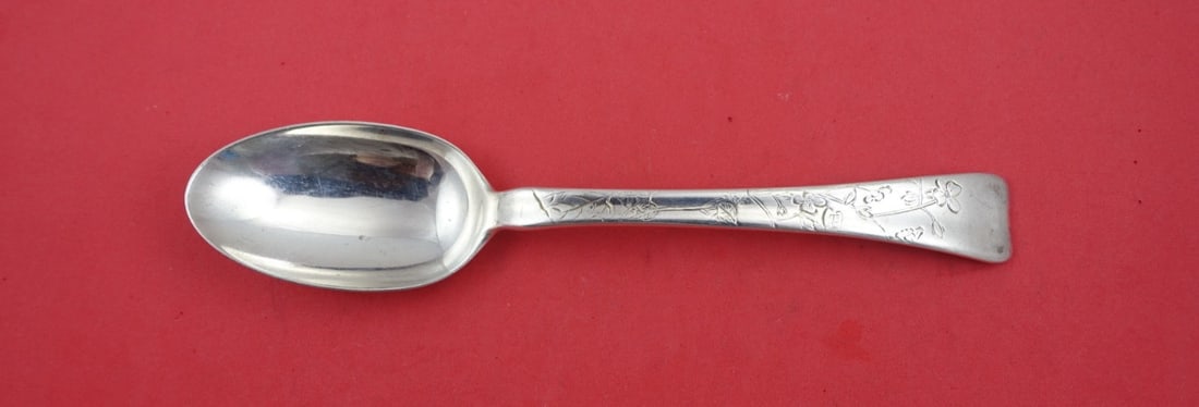 Tiffany Sterling Silver Serving Spoon Hand Engraved Forget Me Nots 8.625": Tiffany Sterling Silver Serving Spoon Hand Engraved Forget Me Nots 8.625" This exquisite serving spoon is crafted by Tiffany & Co. and features the elegant Lap Over Edge Hand Engraved pattern. The spo