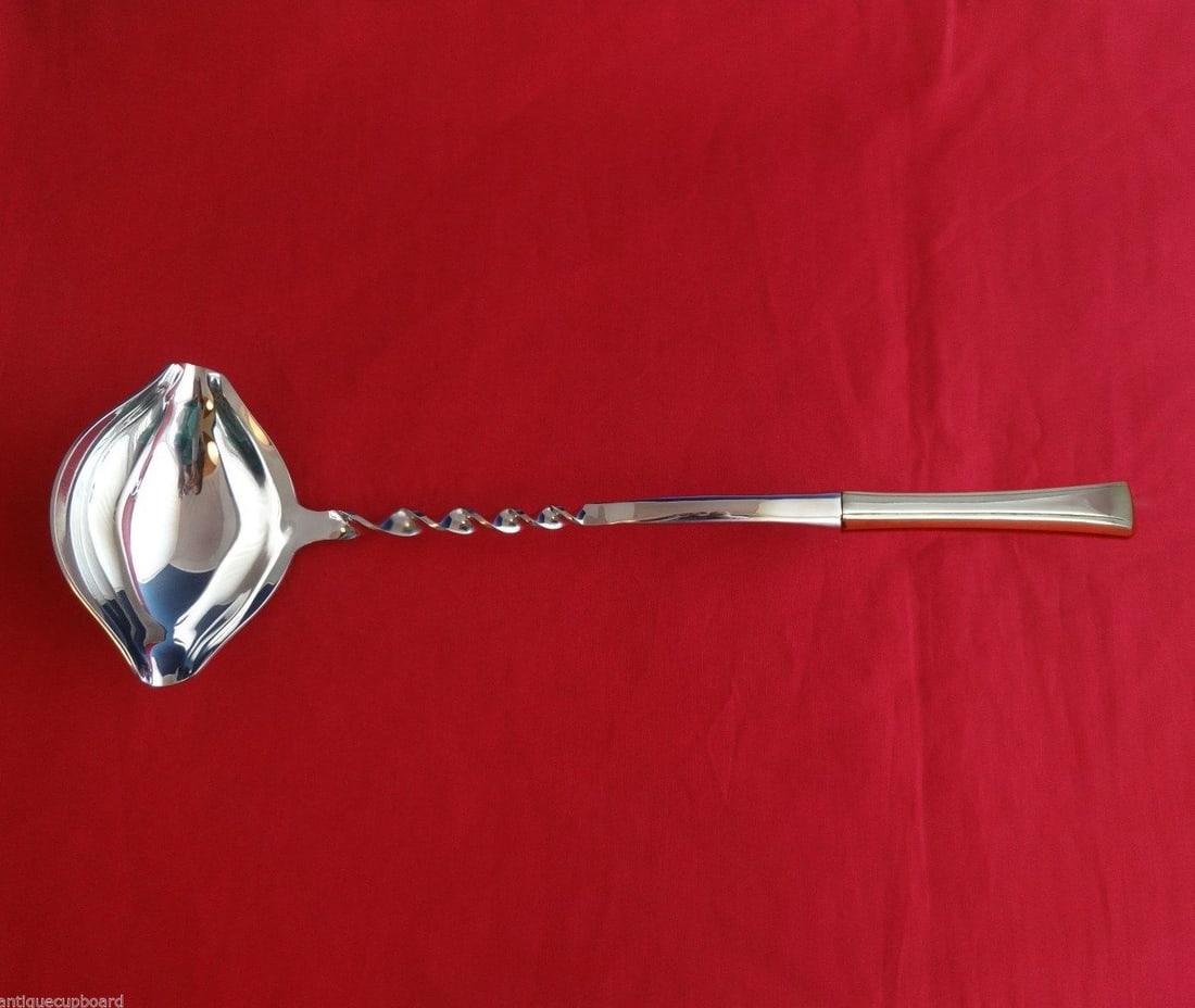 International Tranquility Sterling Silver Punch Ladle 13 3/4 Custom Twist Handle: International Tranquility Sterling Silver Punch Ladle 13 3/4 Custom Twist Handle Introducing this exquisite Tranquility Punch Ladle from International, crafted from high-quality sterling silver. This