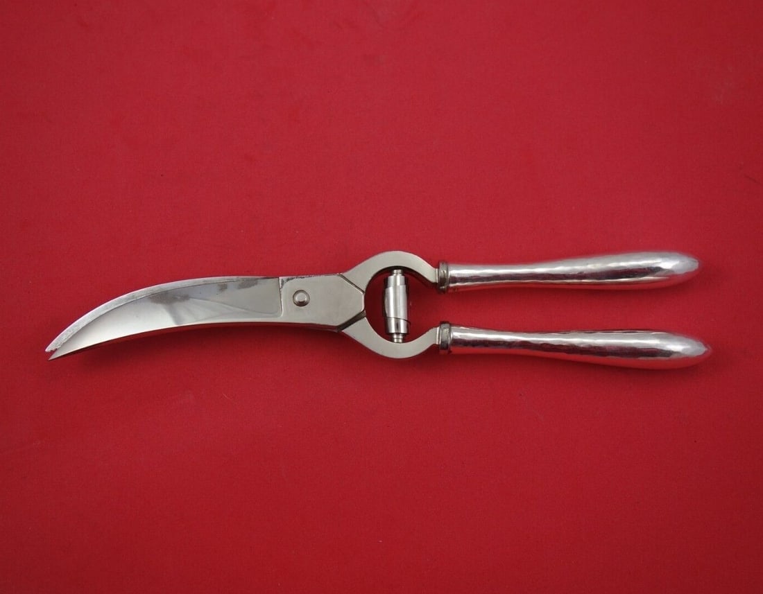 Shreve Antique Hammered Sterling Silver 10 Inch Lobster Shears: Shreve Antique Hammered Sterling Silver 10 Inch Lobster Shears Elevate your dining experience with these exquisite Antique Hammered Lobster Shears by Shreve. Crafted from high-quality sterling silver,