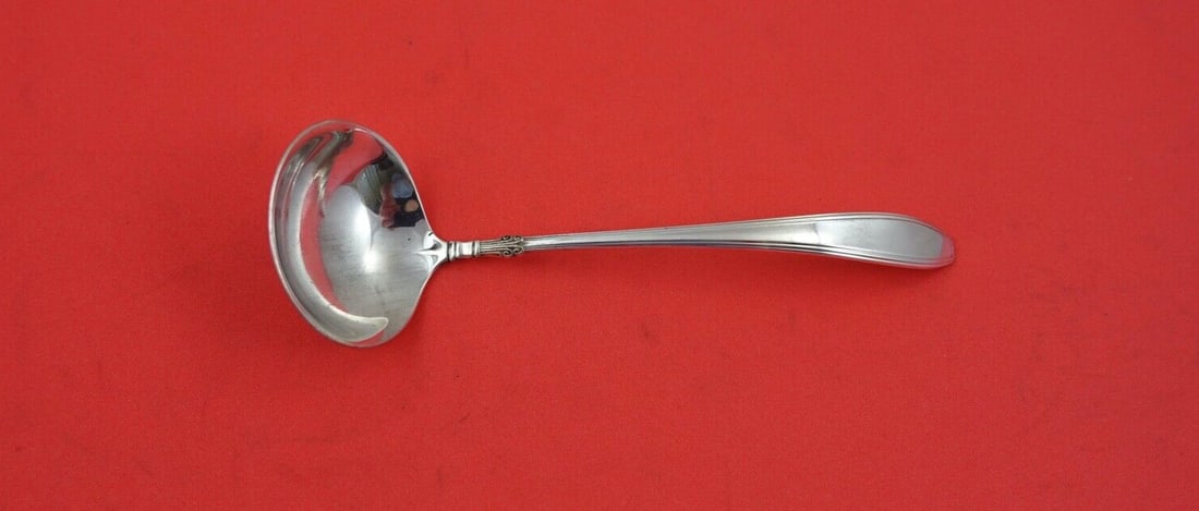 Gorham Nocturne Sterling Silver Sauce Ladle 5 3/8 Inches: Gorham Nocturne Sterling Silver Sauce Ladle 5 3/8 Inches Elevate your dining experience with this exquisite Nocturne sauce ladle by Gorham, crafted from high-quality sterling silver. Designed with ele