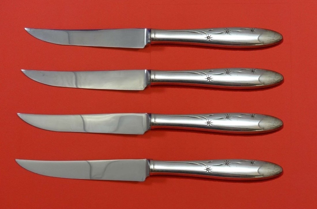 Gorham Celeste Sterling Silver Steak Knife Set 4pc Custom Made 8.5": Gorham Celeste Sterling Silver Steak Knife Set 4pc Custom Made 8.5" This exquisite 4-piece steak knife set features the elegant Celeste pattern by Gorham. Each knife boasts a sterling silver hollow ha