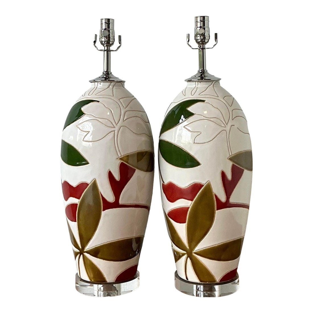 Pair of Palm Beach Botanical Ceramic Table Lamps on Acrylic Bases: Pair of Palm Beach Botanical Ceramic Table Lamps on Acrylic Bases This pair of vintage table lamps features ovoid ceramic bodies with a high-gloss white glaze, intricately etched with stylized botanic