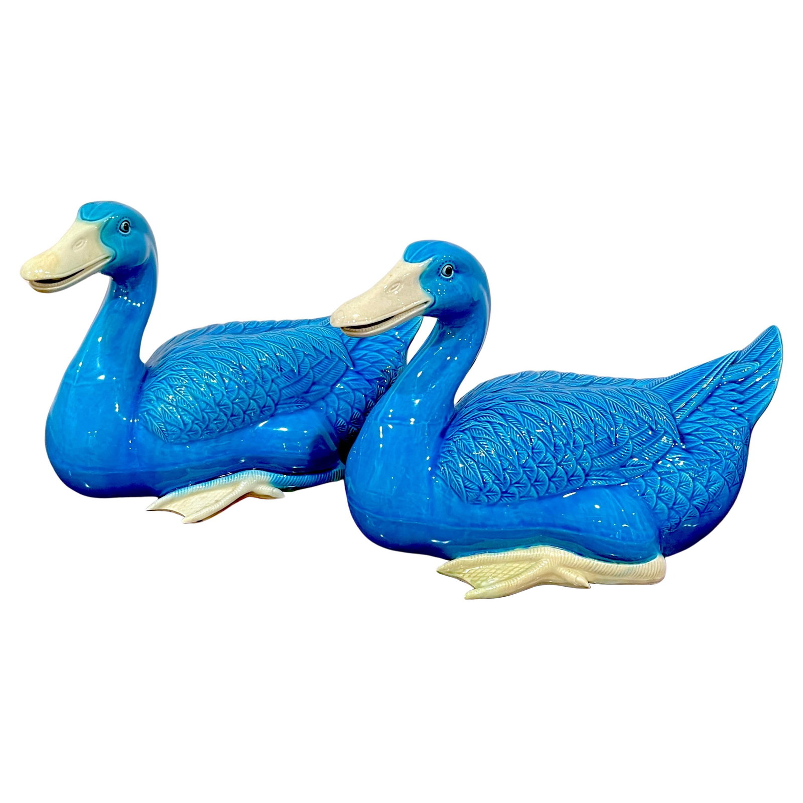 Set of 2 Turquoise Chinese Export Seated Duck Figures: Set of 2 Turquoise Chinese Export Seated Duck Figures This large pair of turquoise Chinese Export figures of seated ducks showcases exquisite craftsmanship from the early 20th century. Originating fro