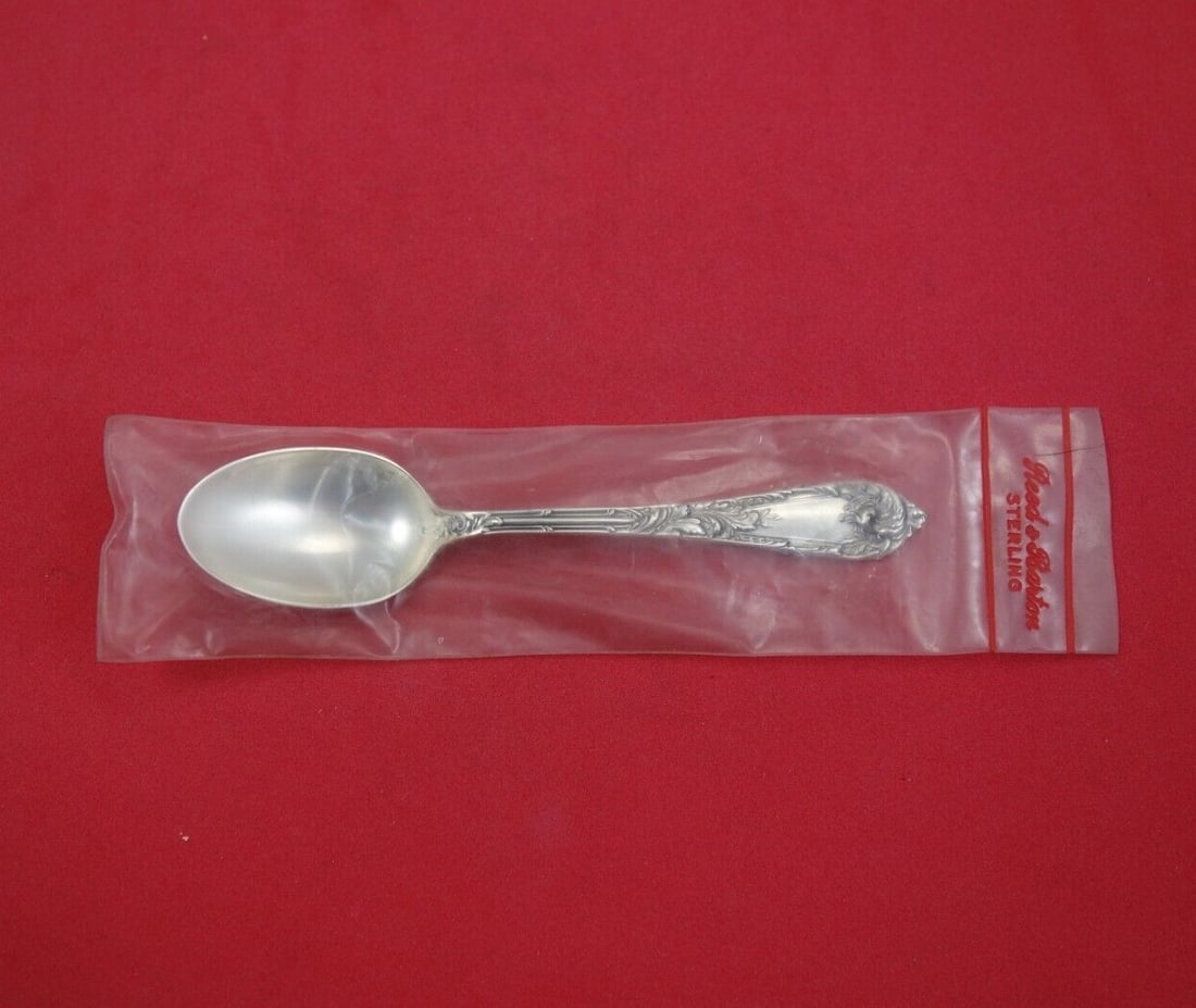Reed and Barton Romaine Sterling Silver Demitasse Spoon 4 1/4 inches: Reed and Barton Romaine Sterling Silver Demitasse Spoon 4 1/4 inches This exquisite Romaine demitasse spoon by Reed and Barton is crafted from high-quality sterling silver. Measuring 4 1/4 inches, thi