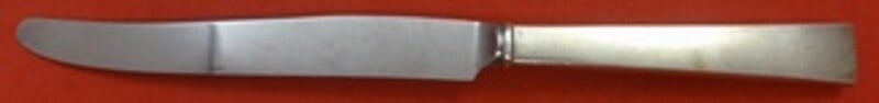 International Continental Sterling Silver Dinner Knife 9 1/2": International Continental Sterling Silver Dinner Knife 9 1/2" This exquisite dinner knife features a hollow handle crafted from sterling silver, complemented by a durable stainless steel blade. The kn