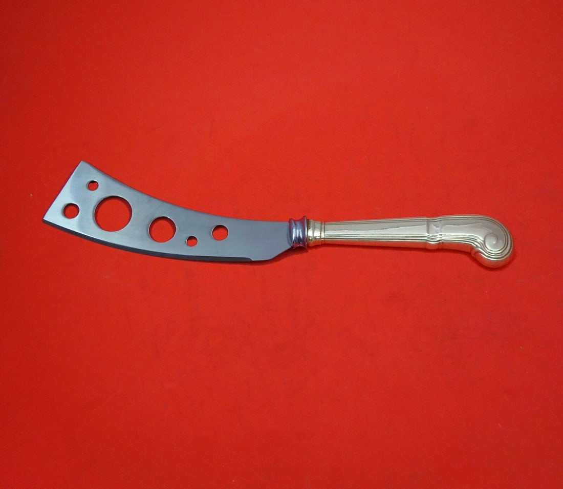 Tiffany Co Castilian Sterling Silver Handle Soft Cheese Knife 7 Inch: Tiffany Co Castilian Sterling Silver Handle Soft Cheese Knife 7 Inch This Tiffany & Co. soft cheese knife features a sterling silver hollow handle with a stainless steel pierced blade. The blade inclu