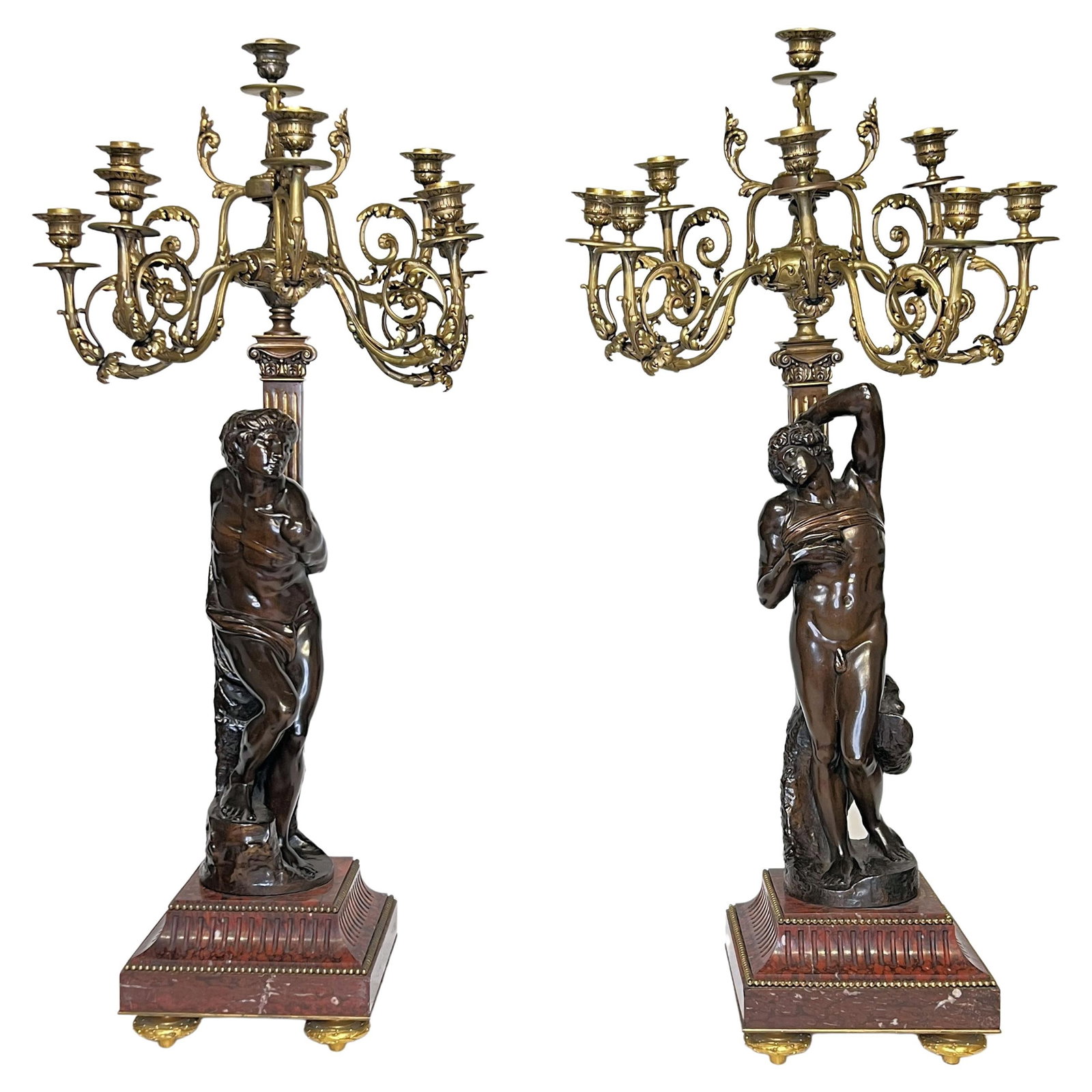 Set of Two Neoclassical Gilt Bronze Candelabra Attributed to Barbedienne: Set of Two Neoclassical Gilt Bronze Candelabra Attributed to Barbedienne This pair of French Neoclassical Revival candelabra from the late 19th century is crafted by Barbedienne of Paris. Made from gi