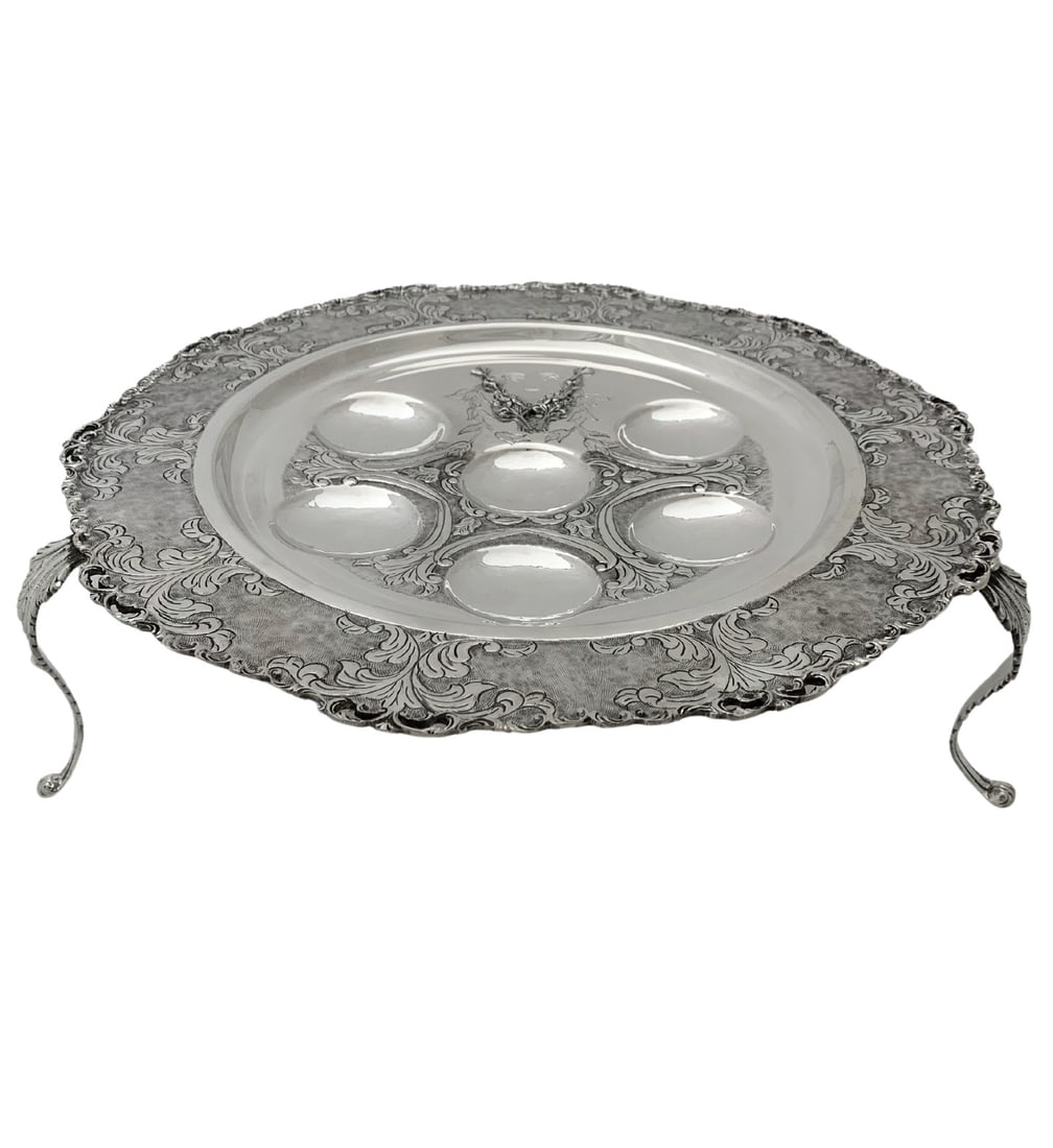 Elegant 3 Leg Seder Plate in 925 Sterling Silver with Floral Appliques: Elegant 3 Leg Seder Plate in 925 Sterling Silver with Floral Appliques This exquisite 925 Sterling Silver 3 Leg Seder Plate is a stunning centerpiece for your Passover celebrations. Expertly handcraft