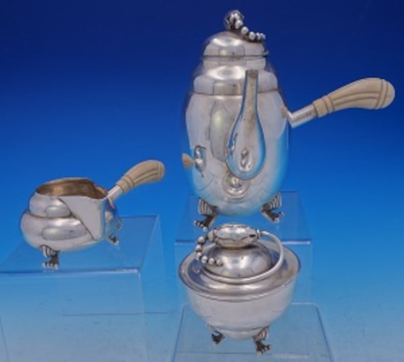 Three-Piece Sterling Silver Blossom Tea Service by William L deMatteo: Three-Piece Sterling Silver Blossom Tea Service by William L deMatteo This is a Blossom pattern three-piece tea set by William L. deMatteo, crafted from sterling silver (.925) in the United States. Th