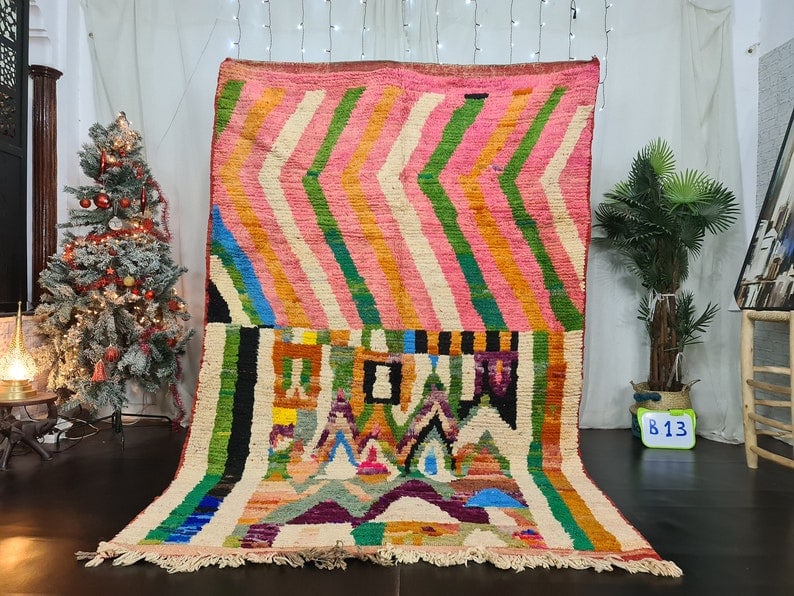 Authentic Handmade Moroccan Berber Wool Rug 8 x 5 Feet: Authentic Handmade Moroccan Berber Wool Rug 8 x 5 Feet Experience the beauty of Moroccan craftsmanship with this Authentic Colorful Handmade Moroccan Berber Wool Rug. Handwoven by local Berber women i