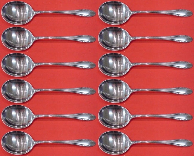 Gorham Lyric Sterling Silver 12-Piece Cream Soup Spoon Set: Gorham Lyric Sterling Silver 12-Piece Cream Soup Spoon Set This exquisite 12-piece set of cream soup spoons is crafted from high-quality sterling silver in the elegant Lyric pattern by Gorham. Each sp