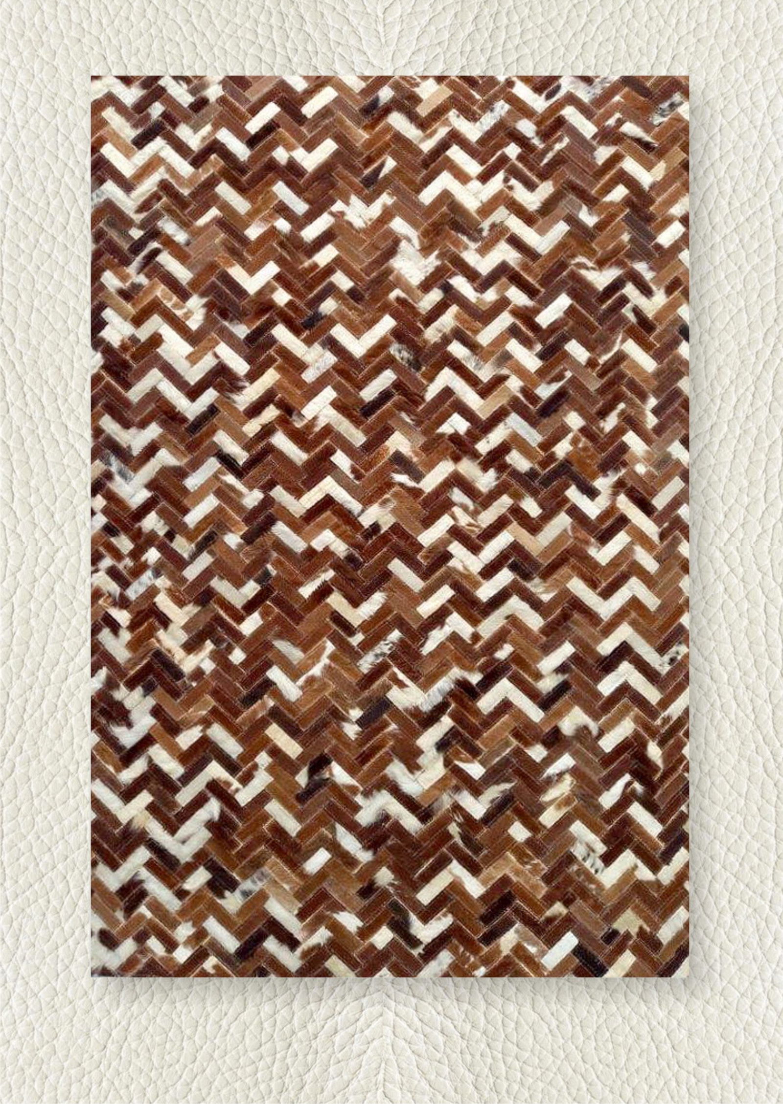 Artisan Hand Stitched Chevron Hair On Hide Leather Rug 3ft x 5ft: Artisan Hand Stitched Chevron Hair On Hide Leather Rug 3ft x 5ft Free continental US Shipping This artisan hand-stitched chevron rug is crafted from premium hair-on-hide leather, offering a bold and r