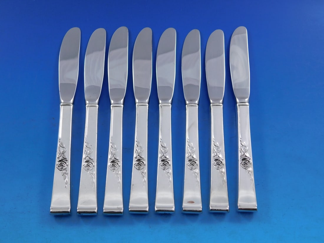 Reed and Barton Classic Rose Sterling Silver Butter Spreader Set of 8: Reed and Barton Classic Rose Sterling Silver Butter Spreader Set of 8 This exquisite set features eight butter spreaders from the renowned Classic Rose pattern by Reed & Barton. Each piece is crafted