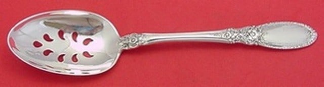Towle Sterling Silver Old Mirror Pattern Pierced Serving Spoon 9-Hole 8 1/2": Towle Sterling Silver Old Mirror Pattern Pierced Serving Spoon 9-Hole 8 1/2" This exquisite serving spoon from Towle features the classic Old Mirror pattern, crafted from high-quality sterling silver.