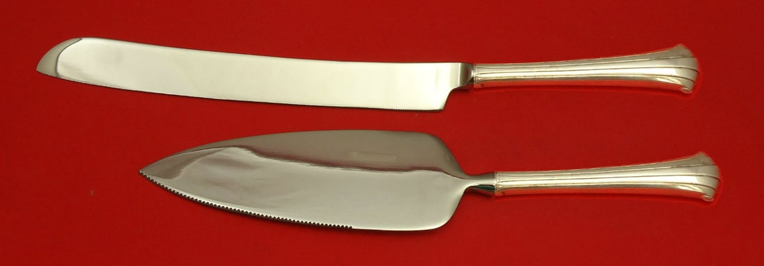 Gorham Newport Scroll Sterling Silver Wedding Cake Set 2pc: Gorham Newport Scroll Sterling Silver Wedding Cake Set 2pc Introducing the Newport Scroll Wedding Cake Set by Gorham, a stunning 2-piece set crafted from sterling silver. This elegant set features gra