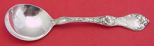 Reed & Barton Les Cinq Fleurs Sterling Cream Soup Spoon 5 7/8": Reed & Barton Les Cinq Fleurs Sterling Cream Soup Spoon 5 7/8" This exquisite cream soup spoon from Reed & Barton showcases the elegant Les Cinq Fleurs pattern. Crafted from high-quality sterling silv