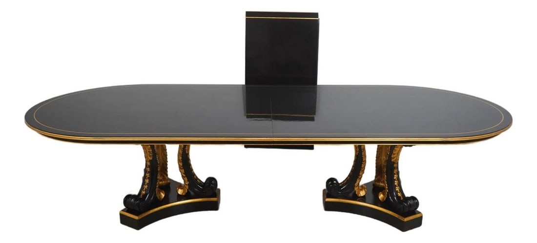 Hollywood Regency Ebony Gold Oval Double Pedestal Dining Table: Hollywood Regency Ebony Gold Oval Double Pedestal Dining Table This stunning Neoclassical Hollywood Regency dining table features an impressive design with genuine gold leaf accents and fine carved de
