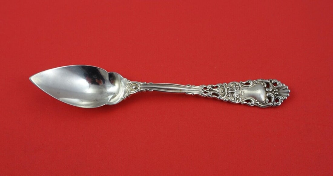 Dominick & Haff Renaissance Sterling Silver Grapefruit Spoon 5 5/8": Dominick & Haff Renaissance Sterling Silver Grapefruit Spoon 5 5/8" This exquisite grapefruit spoon from the Renaissance pattern by Dominick & Haff is crafted from high-quality sterling silver. With a