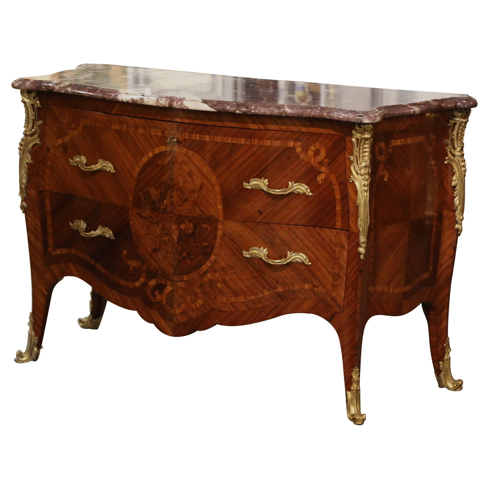 Antique French Louis XV Marquetry Commode with Rouge Royale Marble Top: Antique French Louis XV Marquetry Commode with Rouge Royale Marble Top Elevate your interior with this exquisite Early 20th Century French Louis XV Marquetry Commode, crafted circa 1920. This antique