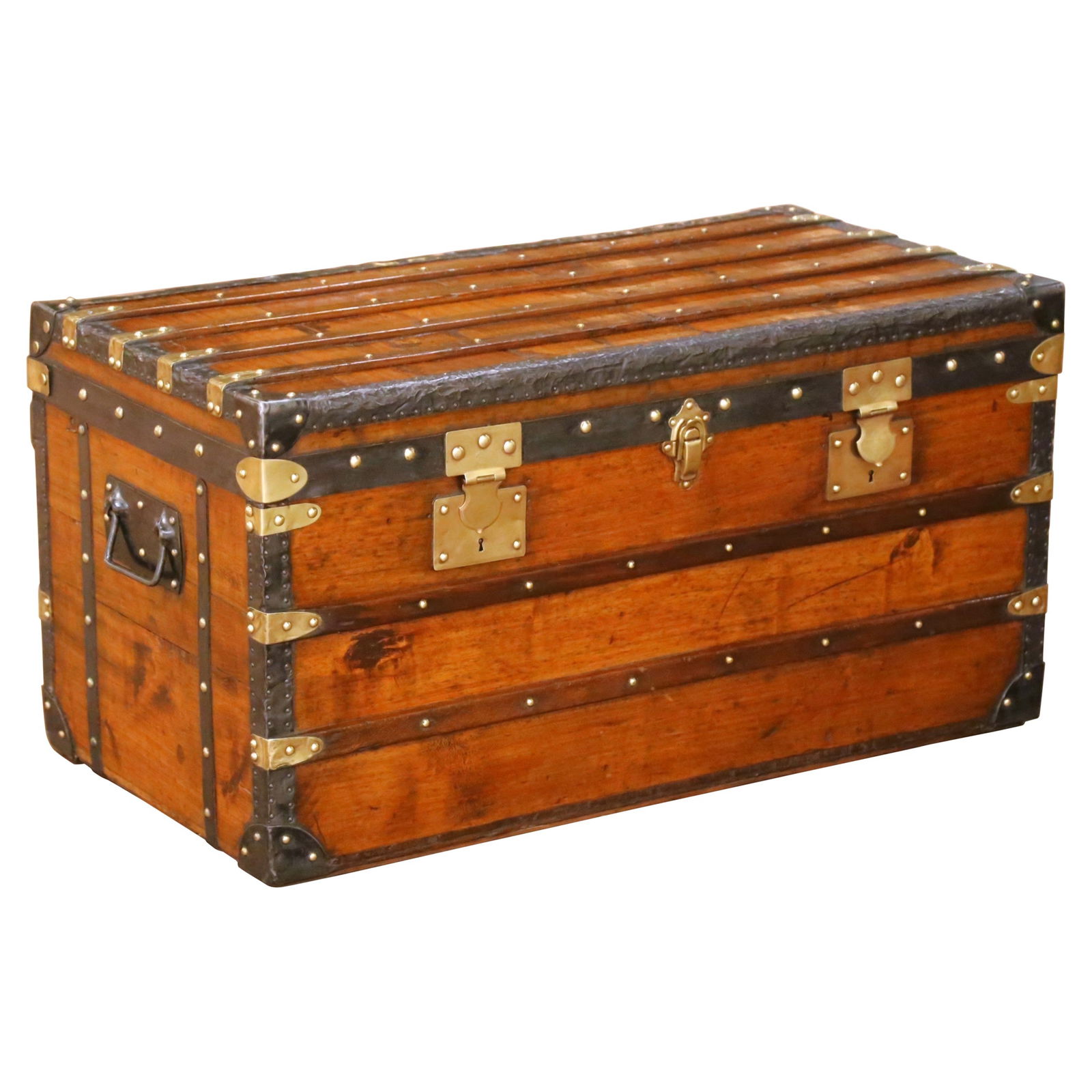 Belle Epoque Paris Travel Trunk with Brass Accents and Poplar Construction circa 1890: Belle Epoque Paris Travel Trunk with Brass Accents and Poplar Construction circa 1890 This elegant late 19th-century Parisian travel trunk showcases classic Belle Epoque style and exceptional French c