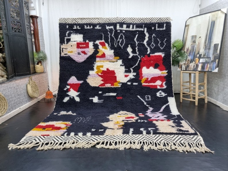 Authentic Handmade Moroccan Black Colorful Wool Area Rug 9.84 x 6.56 Feet: Authentic Handmade Moroccan Black Colorful Wool Area Rug 9.84 x 6.56 Feet Enhance your space with this stunning authentic handmade Moroccan Berber wool area rug. Handwoven by skilled local Berber wome