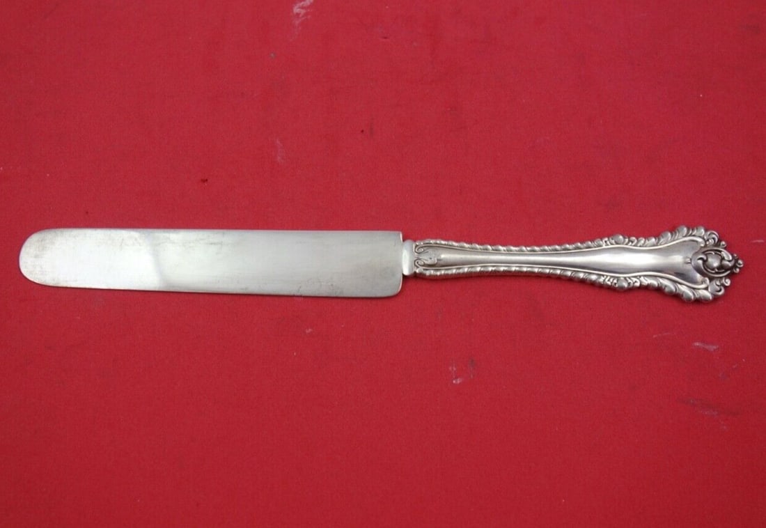 Dominick & Haff Mazarin Sterling Silver Dessert Knife 8 Inch: Dominick & Haff Mazarin Sterling Silver Dessert Knife 8 Inch This exquisite dessert knife features the Mazarin pattern by Dominick & Haff. Crafted from high-quality sterling silver, it boasts a flat h