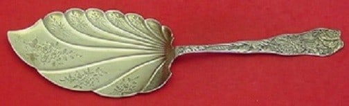 Wallace Saint Leon Sterling Silver Ice Cream Server 9 1/4 Bright-Cut: Wallace Saint Leon Sterling Silver Ice Cream Server 9 1/4 Bright-Cut This exquisite ice cream server is crafted from sterling silver and features the elegant Saint Leon pattern by Wallace. Measuring 9
