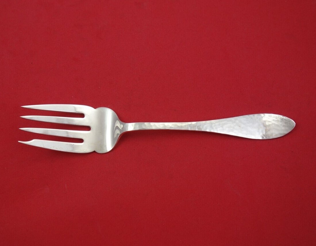 Shreve Antique Hammered Sterling Silver Cold Meat Fork 7.5": Shreve Antique Hammered Sterling Silver Cold Meat Fork 7.5" This exquisite cold meat fork, crafted by Shreve, showcases the elegant Antique Hammered pattern. Made from high-quality sterling silver, th