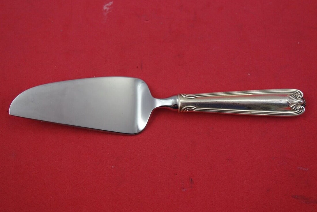 Towle Benjamin Franklin Sterling Silver Cheese Server 6 3/4": Towle Benjamin Franklin Sterling Silver Cheese Server 6 3/4" This elegant cheese server is part of the Benjamin Franklin pattern by Towle, crafted from high-quality sterling silver. Featuring a hollow