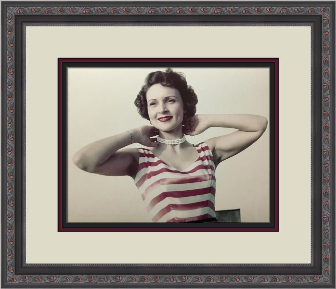 Framed Colorized 8x10 Reproduction Photo of Betty White: Framed Colorized 8x10 Reproduction Photo of Betty White This colorized reproduction photograph of Betty White measures 8" x 10" and is custom framed in a 1-inch black ornate frame. The piece features