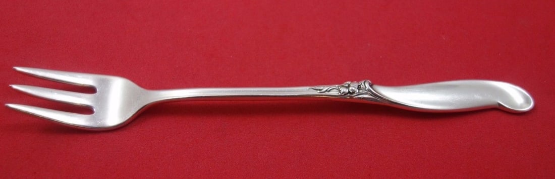 International Sterling Silver Cocktail Fork Silver Melody 5.5 Inch: International Sterling Silver Cocktail Fork Silver Melody 5.5 Inch This exquisite cocktail fork is part of the Silver Melody pattern by International Sterling. Crafted from high-quality sterling silve