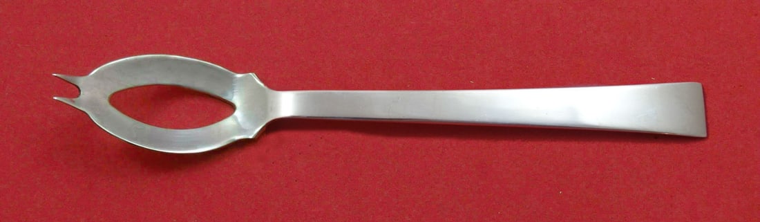 International Sterling Silver Olive Spoon 5 3/4" Continental Pattern: International Sterling Silver Olive Spoon 5 3/4" Continental Pattern This exquisite olive spoon is crafted from sterling silver in the elegant Continental pattern by International. Measuring 5 3/4" in