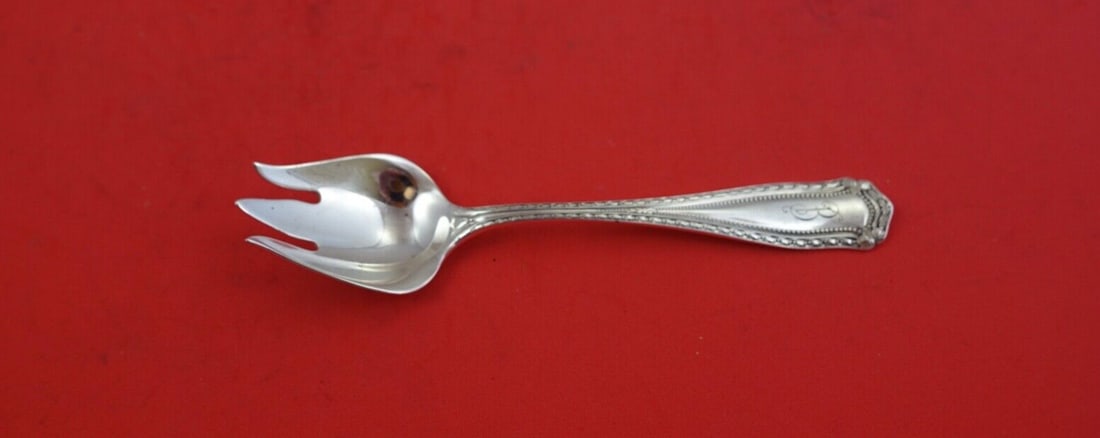 Shreve Marie Louise Sterling Silver 5 Inch Ice Cream Fork 3 Tine Monogrammed: Shreve Marie Louise Sterling Silver 5 Inch Ice Cream Fork 3 Tine Monogrammed This exquisite ice cream fork from the Marie Louise pattern by Shreve is crafted from high-quality sterling silver. Featuri