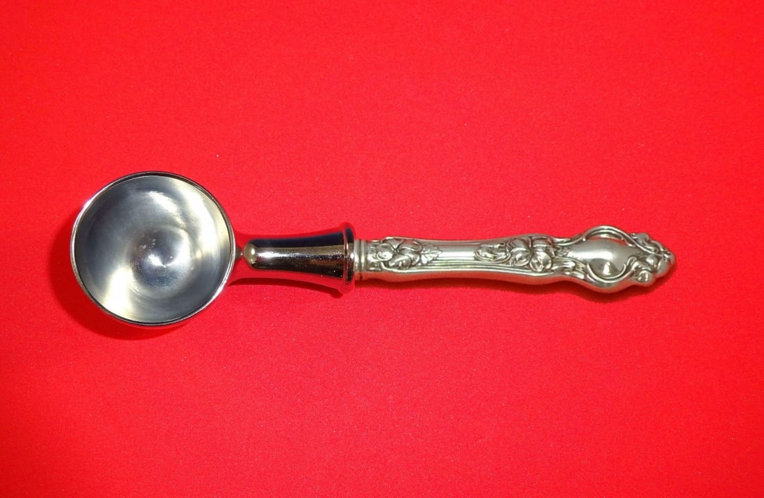 Wallace Violet Sterling Silver Custom Coffee Scoop 6 Inch: Wallace Violet Sterling Silver Custom Coffee Scoop 6 Inch Introducing the Violet Coffee Scoop by Wallace, a beautifully crafted piece made of sterling silver. This custom-made coffee scoop features a