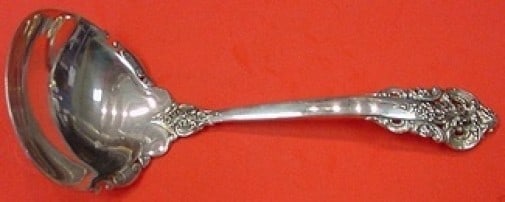 Wallace Grande Baroque Sterling Silver Gravy Ladle 6.625 inches: Wallace Grande Baroque Sterling Silver Gravy Ladle 6.625 inches This exquisite sterling silver gravy ladle from the Grande Baroque pattern by Wallace is a classic addition to any dining collection. Me