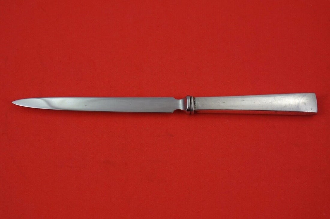 International Sterling Silver Continental Letter Opener 8 3/4 inches: International Sterling Silver Continental Letter Opener 8 3/4 inches This exquisite letter opener features the Continental pattern by International Sterling. Crafted from sterling silver, it boasts a
