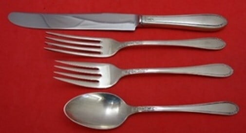 International Sterling Silver Nosegay 4-Piece Place Setting: International Sterling Silver Nosegay 4-Piece Place Setting Elevate your dining experience with this elegant 4-piece place setting from the Nosegay pattern by International Sterling. Crafted from prem