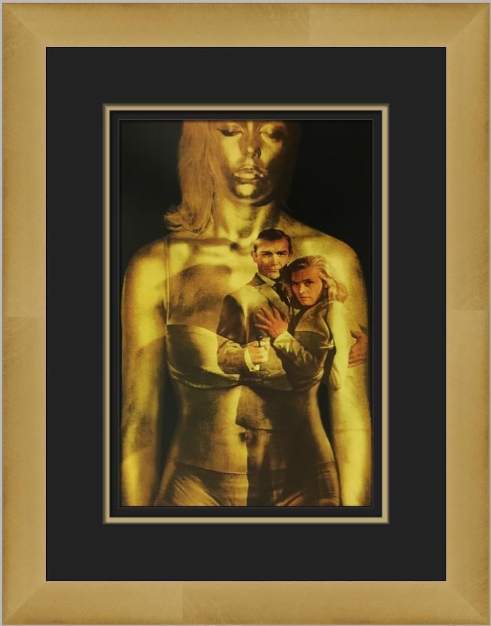 007 Goldfinger Framed Movie Poster 11 x 7 Reproduction: 007 Goldfinger Framed Movie Poster 11 x 7 Reproduction This custom framed movie poster print features the iconic film '007 Goldfinger.' Measuring 11" x 7" for the print and 17" x 13" for the overall f