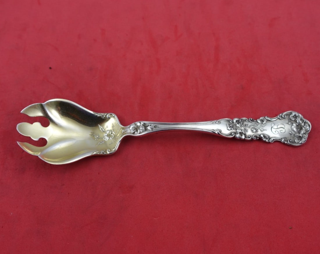 International Sterling Silver Pansy Ice Cream Fork Gold Washed 5 7/8": International Sterling Silver Pansy Ice Cream Fork Gold Washed 5 7/8" This exquisite ice cream fork from the Pansy pattern by International Sterling is a beautiful addition to any flatware collection.