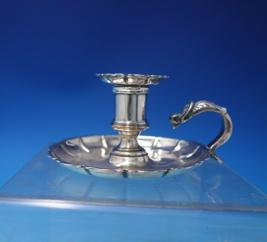 Vintage Silverplate Chamber Stick 2 1/4" Tall x 4" Diameter: Vintage Silverplate Chamber Stick 2 1/4" Tall x 4" Diameter This charming silver on copper chamber stick features a classic design that enhances any decor. Standing at 2 1/4" tall and measuring 4" in