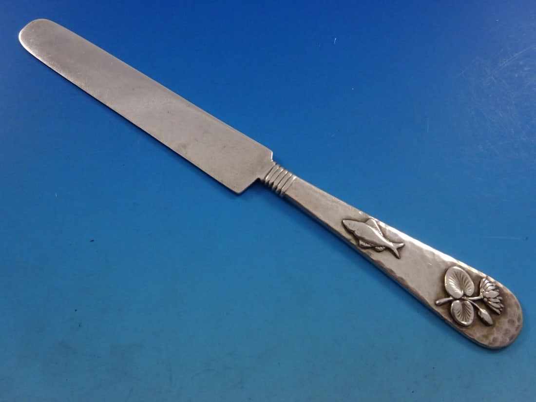 Shiebler 8 Inch Sterling Silver Tea Knife Hammered Applied Lily Fish: Shiebler 8 Inch Sterling Silver Tea Knife Hammered Applied Lily Fish This exquisite tea knife, crafted by Shiebler, showcases the intricate Hammered and Applied pattern, a testament to its aesthetic a