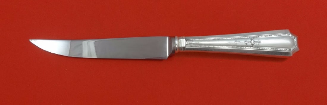 Durgin Colfax Sterling Silver Custom Steak Knife Serrated Blade 8.5": Durgin Colfax Sterling Silver Custom Steak Knife Serrated Blade 8.5" Introducing the Colfax Sterling Silver Steak Knife, expertly crafted by Durgin-Gorham. This custom-made knife features a hollow han