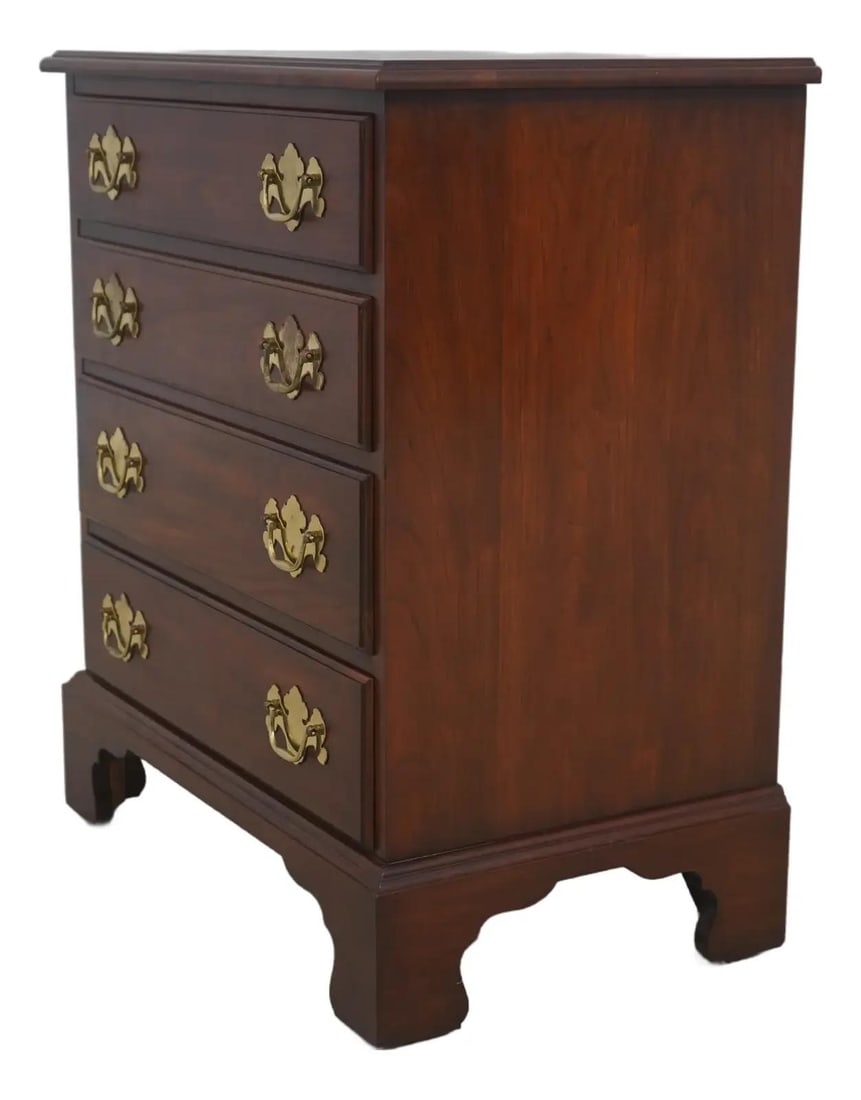 Chippendale Cherry Wood Bachelors Chest with Four Drawers and Brass Hardware: Chippendale Cherry Wood Bachelors Chest with Four Drawers and Brass Hardware This Henkel Harris bachelor's chest features four drawers and is crafted from cherry wood with a #24 finish. The piece show