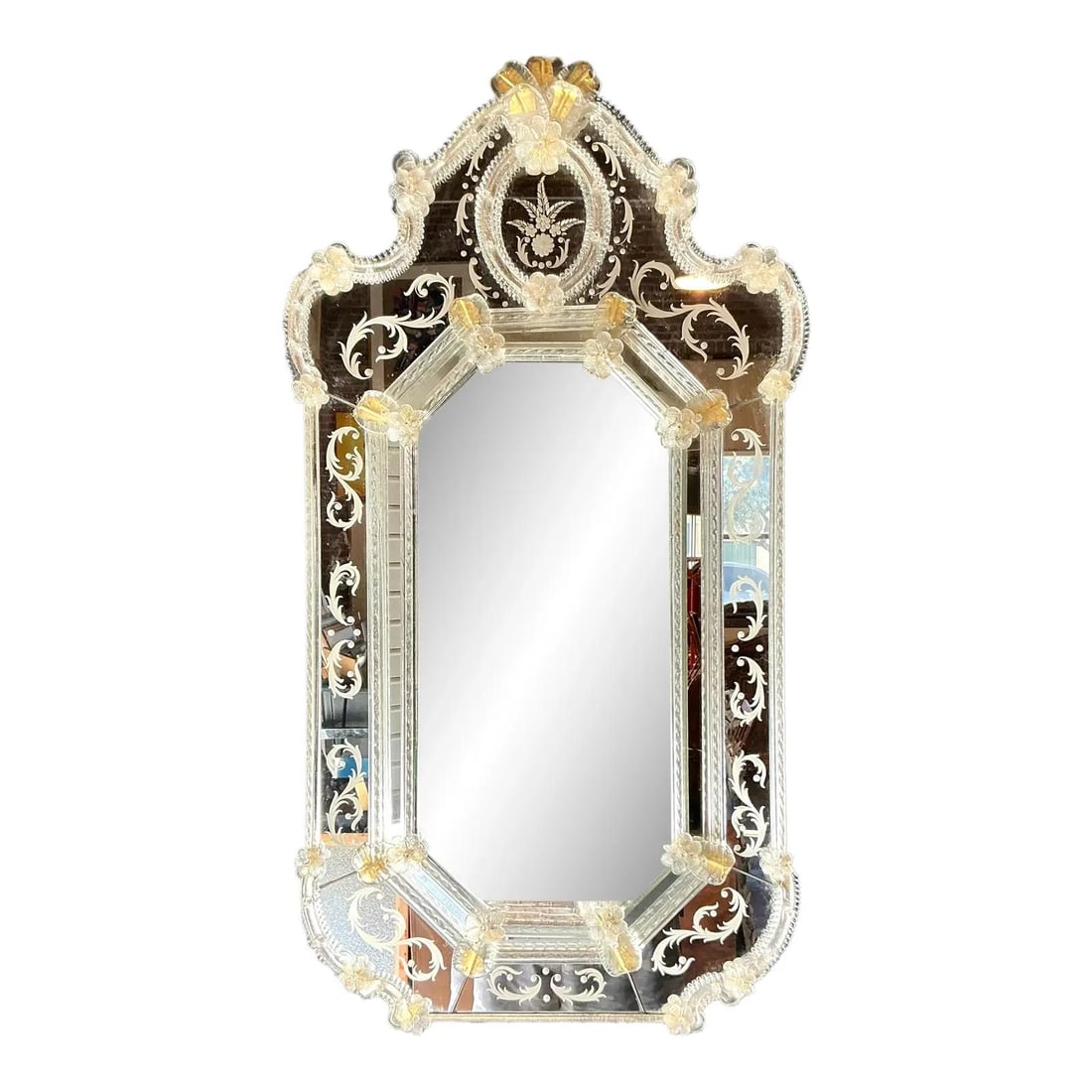 Venetian Glass Wall Mirror With Etched Floral Scrolls and Rosette Accents: Venetian Glass Wall Mirror With Etched Floral Scrolls and Rosette Accents This vintage Venetian etched glass mirror showcases the refined artistry of Italian glasswork. The mirror features a multi-lay